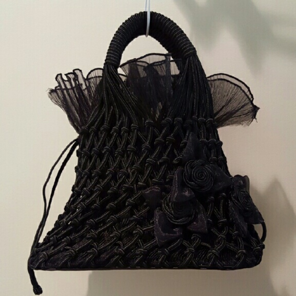 Black Cable Handbag with Flower Design